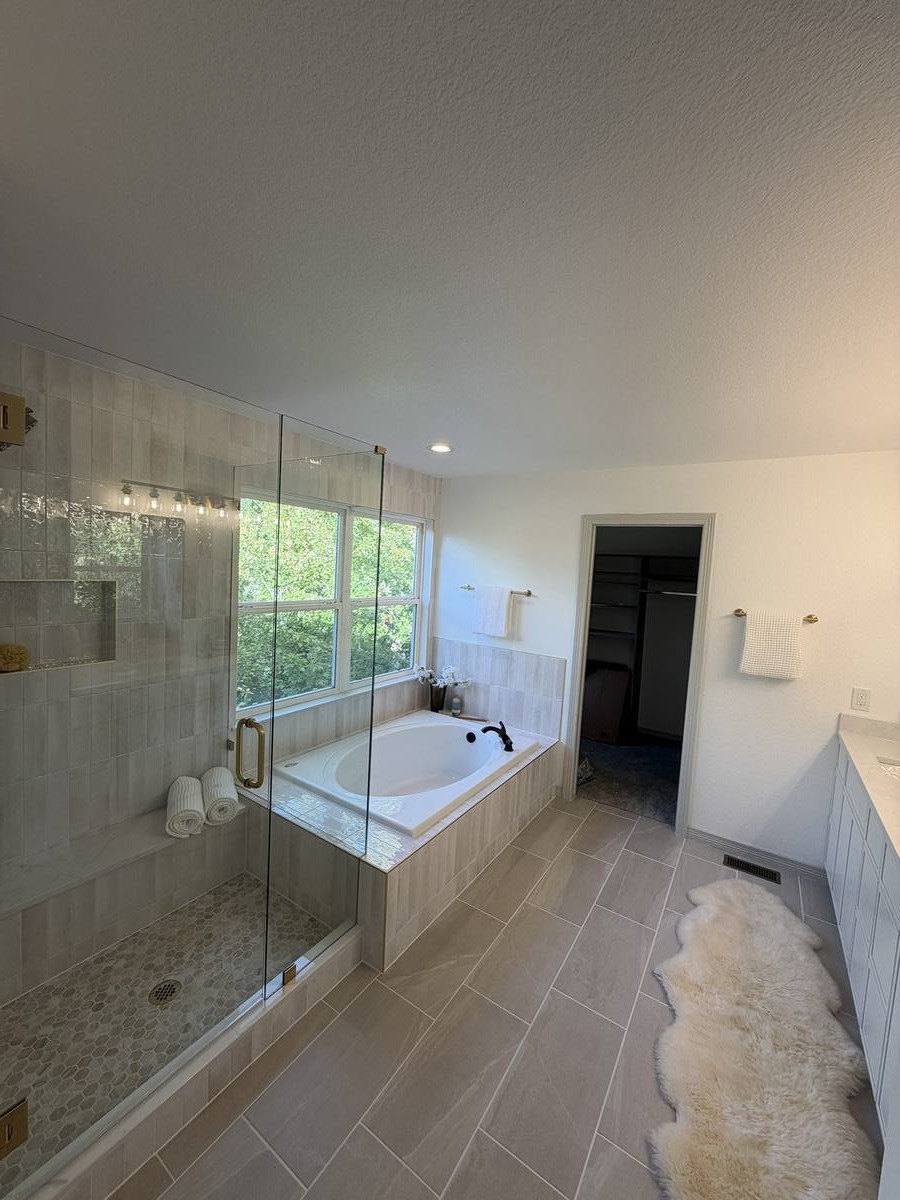 Shower and soaking tub bathroom remodel in Denver by Gribbons Group Corp