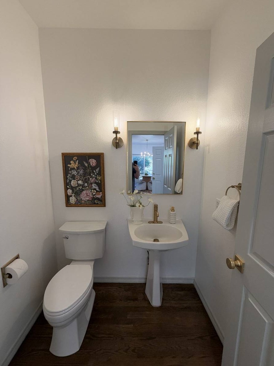 Powder room with pedestal sink — Denver bathroom remodel by Gribbons Group Corp